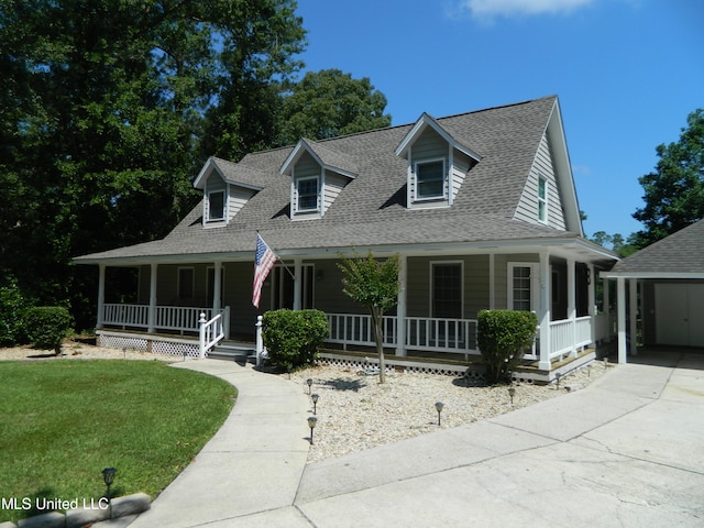 view of front of house featuring a front yard and a porch