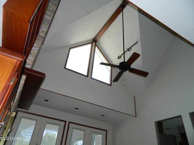 details featuring beam ceiling, french doors, and ceiling fan