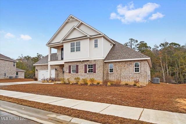 craftsman-style house featuring a balcony and central AC unit