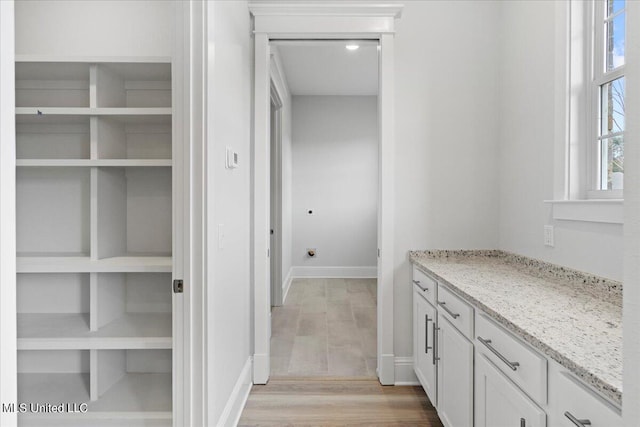 bathroom featuring vanity and hardwood / wood-style flooring