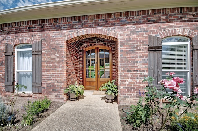 312 Faith Way, Brandon, MS 39042 - view of exterior entry featuring french doors and brick siding
