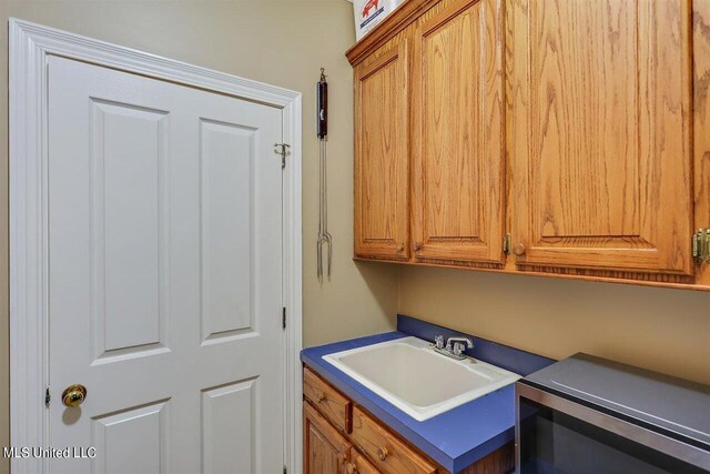 washroom featuring a sink