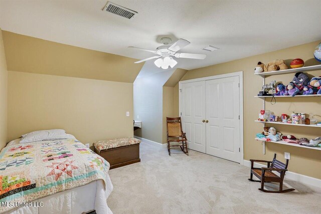 bedroom with visible vents, carpet floors, a closet, baseboards, and a ceiling fan