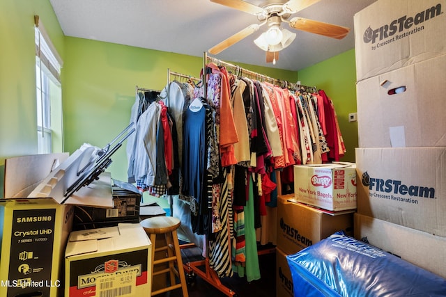 spacious closet with ceiling fan