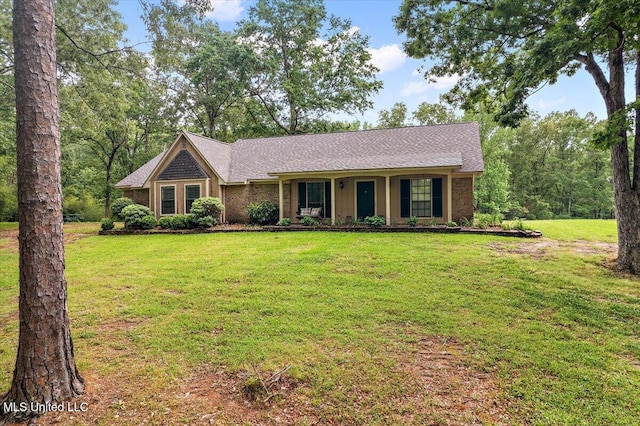 single story home featuring a front yard