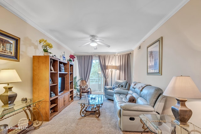 living area with crown molding, a ceiling fan, visible vents, and carpet