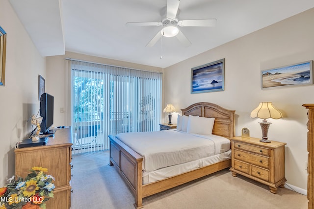 bedroom featuring a baseboard radiator, light carpet, access to outside, and ceiling fan