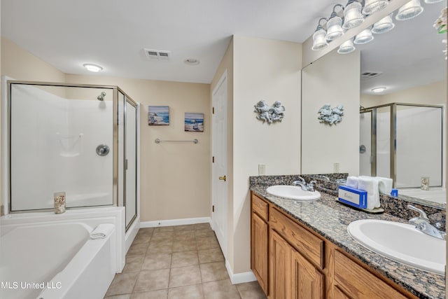 bathroom with vanity, plus walk in shower, and tile patterned flooring