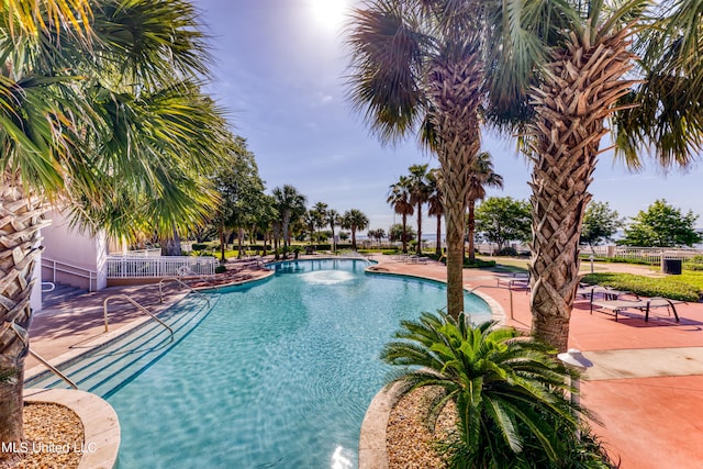 view of swimming pool featuring a patio