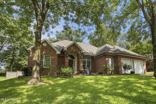 410 Woodland Hills Ct, Madison, MS 39110 - view of front of home featuring brick siding, a garage, a front lawn, and a shingled roof