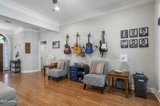 410 Woodland Hills Ct, Madison, MS 39110 - sitting room with wood finished floors and ornamental molding