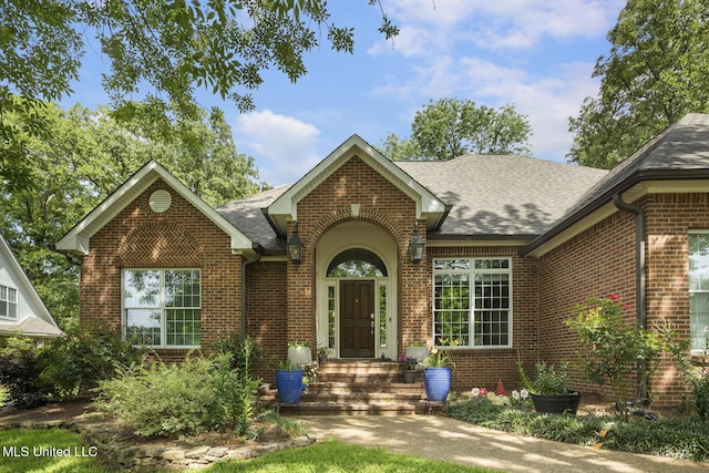 410 Woodland Hills Ct, Madison, MS 39110 - view of front of property with brick siding and roof with shingles