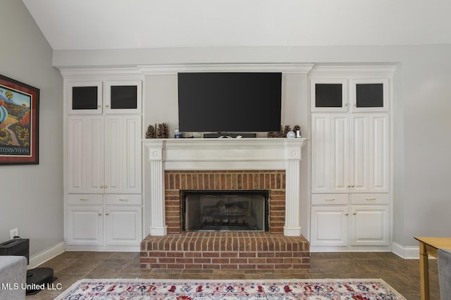 410 Woodland Hills Ct, Madison, MS 39110 - living room with baseboards and a brick fireplace