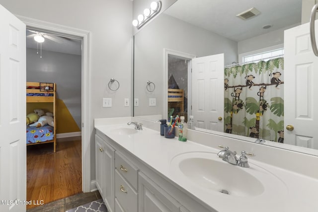 410 Woodland Hills Ct, Madison, MS 39110 - bathroom with double vanity and a ceiling fan