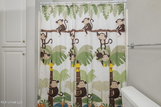 410 Woodland Hills Ct, Madison, MS 39110 - bathroom featuring toilet and curtained shower