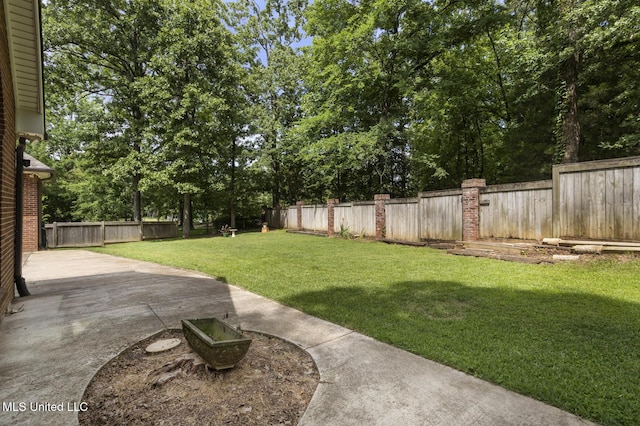 410 Woodland Hills Ct, Madison, MS 39110 - fenced backyard featuring view of scattered trees