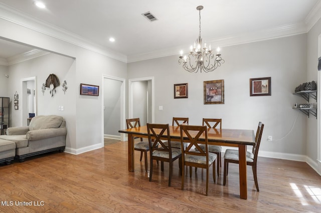 410 Woodland Hills Ct, Madison, MS 39110 - dining space featuring a chandelier, light wood-type flooring, crown molding, and recessed lighting