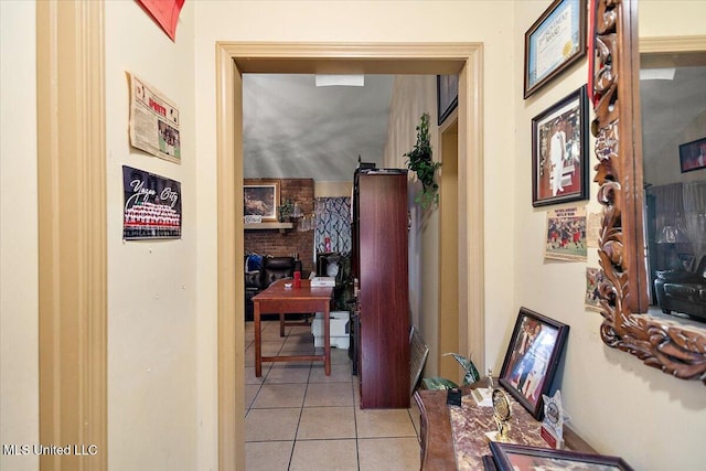 hall featuring light tile patterned floors