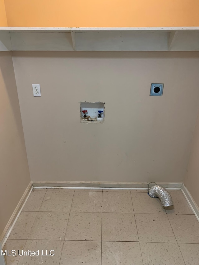 laundry area featuring tile patterned flooring, electric dryer hookup, and washer hookup