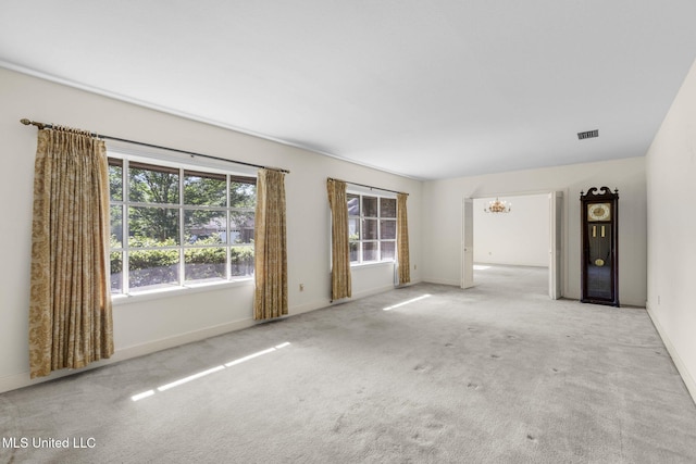 160 Marblehead Ct, Jackson, MS 39211 - carpeted empty room featuring a chandelier and baseboards