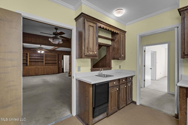 160 Marblehead Ct, Jackson, MS 39211 - kitchen with light colored carpet, light countertops, dark brown cabinets, and crown molding