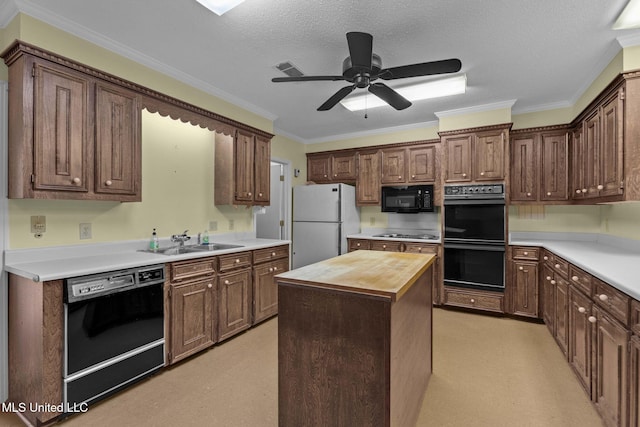 160 Marblehead Ct, Jackson, MS 39211 - kitchen featuring black appliances, butcher block counters, a center island, crown molding, and ceiling fan