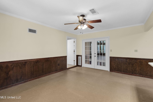 160 Marblehead Ct, Jackson, MS 39211 - unfurnished room featuring french doors, wainscoting, a ceiling fan, crown molding, and wooden walls