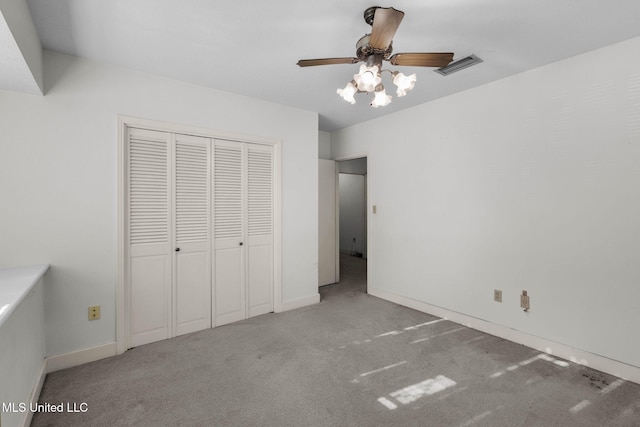 160 Marblehead Ct, Jackson, MS 39211 - unfurnished bedroom with carpet, a closet, and ceiling fan