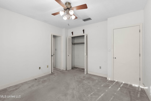 160 Marblehead Ct, Jackson, MS 39211 - unfurnished bedroom featuring light carpet, a closet, and a ceiling fan
