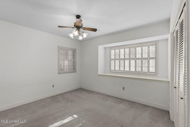 160 Marblehead Ct, Jackson, MS 39211 - unfurnished bedroom with carpet flooring, a closet, and a ceiling fan