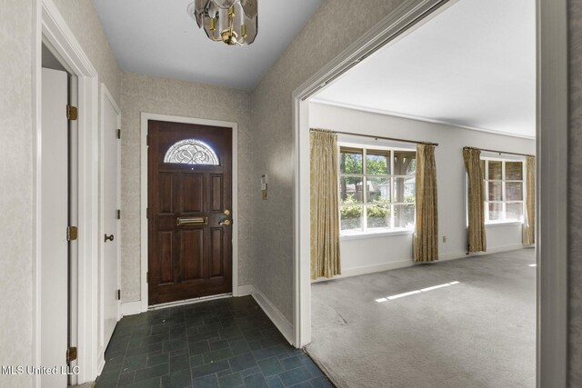 160 Marblehead Ct, Jackson, MS 39211 - foyer entrance featuring a chandelier and baseboards
