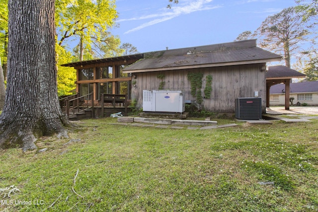 160 Marblehead Ct, Jackson, MS 39211 - back of house with a yard and a wooden deck