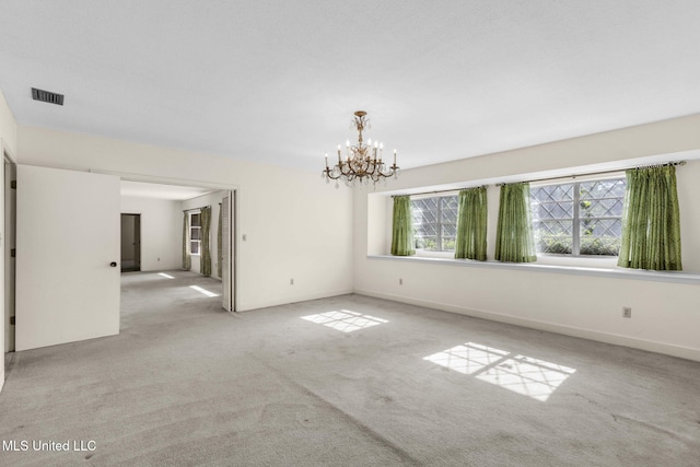 160 Marblehead Ct, Jackson, MS 39211 - carpeted empty room featuring a chandelier and baseboards