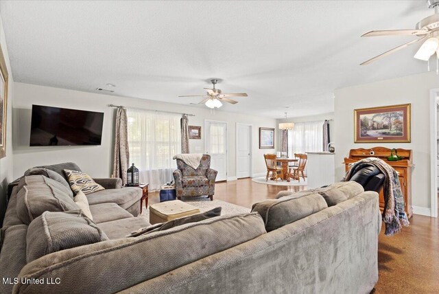 24023 Robert E Lee Rd, Lucedale, MS 39452 - living room with visible vents, a ceiling fan, and baseboards