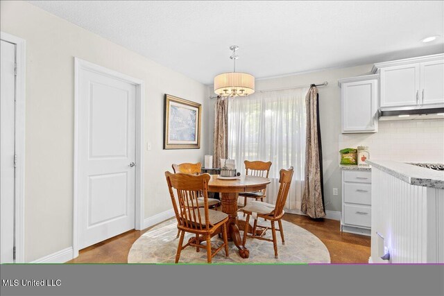 24023 Robert E Lee Rd, Lucedale, MS 39452 - dining space with baseboards and a chandelier
