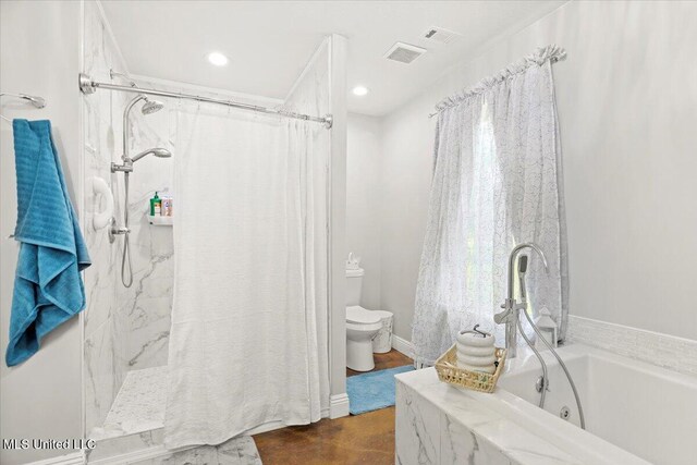 24023 Robert E Lee Rd, Lucedale, MS 39452 - bathroom with a shower with curtain, toilet, a garden tub, and visible vents