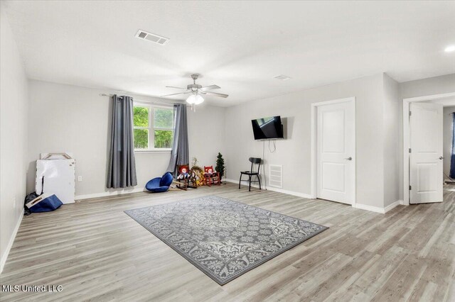 24023 Robert E Lee Rd, Lucedale, MS 39452 - interior space featuring visible vents, ceiling fan, baseboards, and light wood-style floors