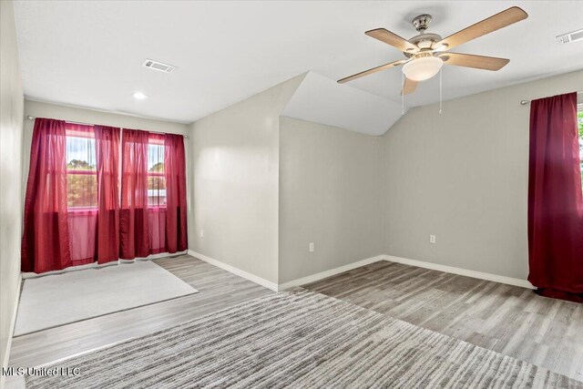 24023 Robert E Lee Rd, Lucedale, MS 39452 - spare room with visible vents, ceiling fan, wood finished floors, and baseboards
