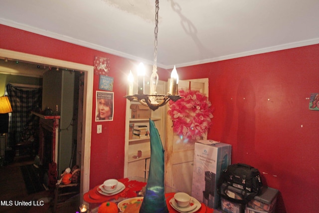 dining room with an inviting chandelier and crown molding