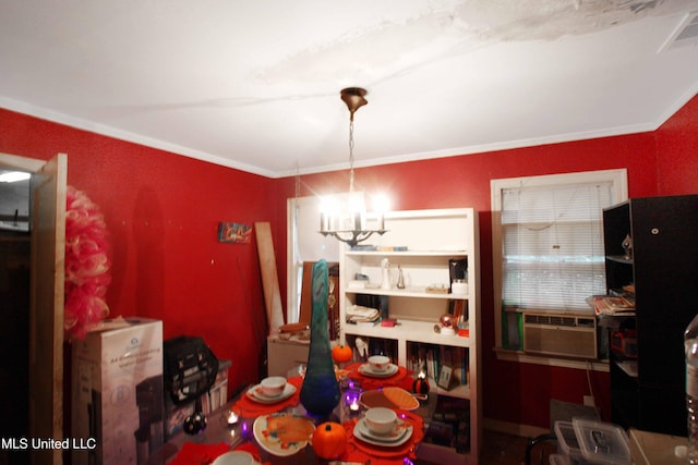 dining room featuring cooling unit, a chandelier, and ornamental molding