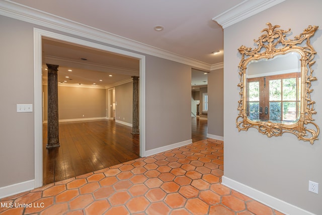 spare room with recessed lighting, baseboards, crown molding, and ornate columns