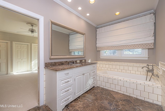 full bathroom featuring a ceiling fan, ornamental molding, vanity, a bath, and recessed lighting