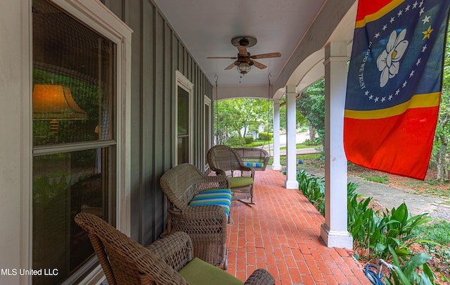 view of patio / terrace with a porch and a ceiling fan