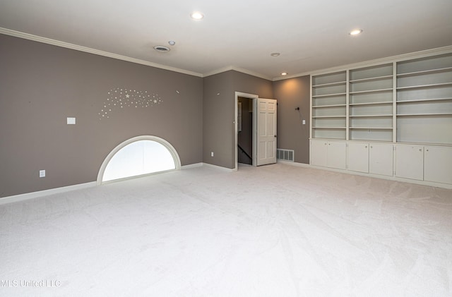 spare room with crown molding, recessed lighting, light colored carpet, visible vents, and baseboards