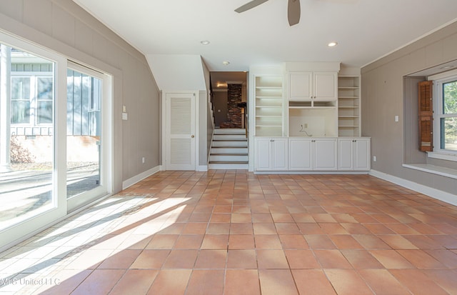 unfurnished living room featuring light tile patterned floors, recessed lighting, a ceiling fan, and baseboards