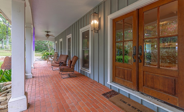 view of patio / terrace featuring a porch and french doors