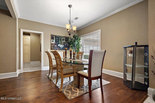 108 Merlot Cv, Clinton, MS 39056 - dining space with a chandelier, wood finished floors, crown molding, and baseboards