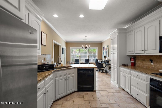 108 Merlot Cv, Clinton, MS 39056 - kitchen with black appliances, a peninsula, a sink, white cabinets, and crown molding