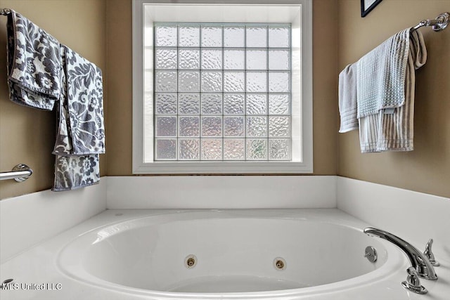 108 Merlot Cv, Clinton, MS 39056 - bathroom featuring healthy amount of natural light and a jetted tub