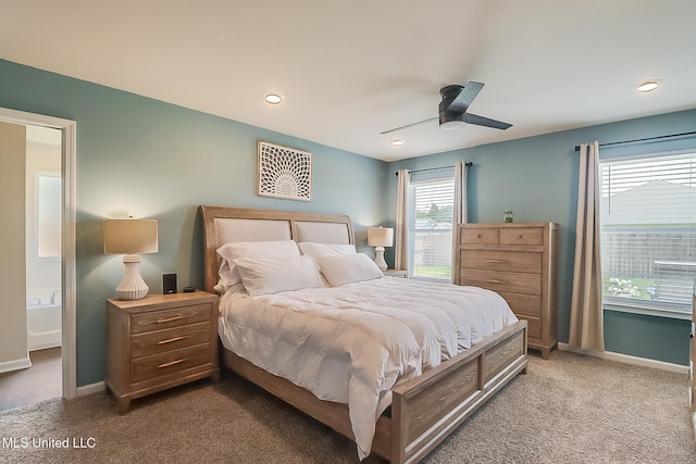 bedroom featuring ceiling fan and carpet